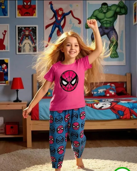 Child wearing Spider-Man pajamas in a bedroom with superhero posters on the wall.